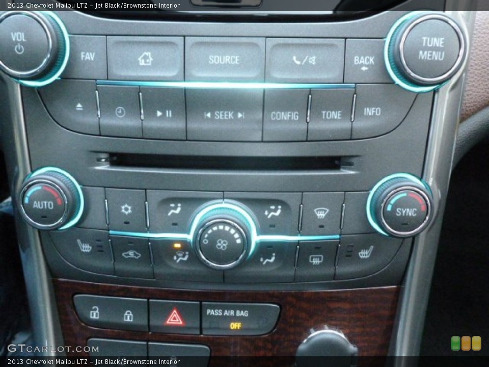 Jet Black/Brownstone Interior Controls for the 2013 Chevrolet Malibu LTZ #73258083