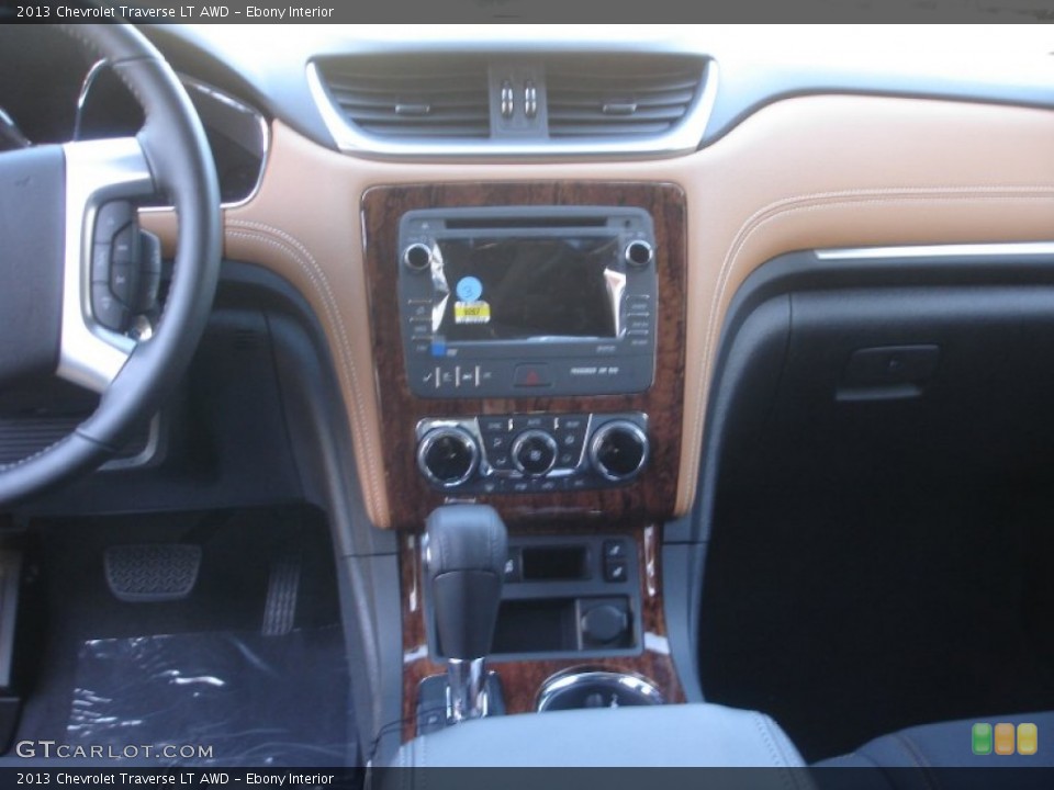 Ebony Interior Dashboard for the 2013 Chevrolet Traverse LT AWD #73396986