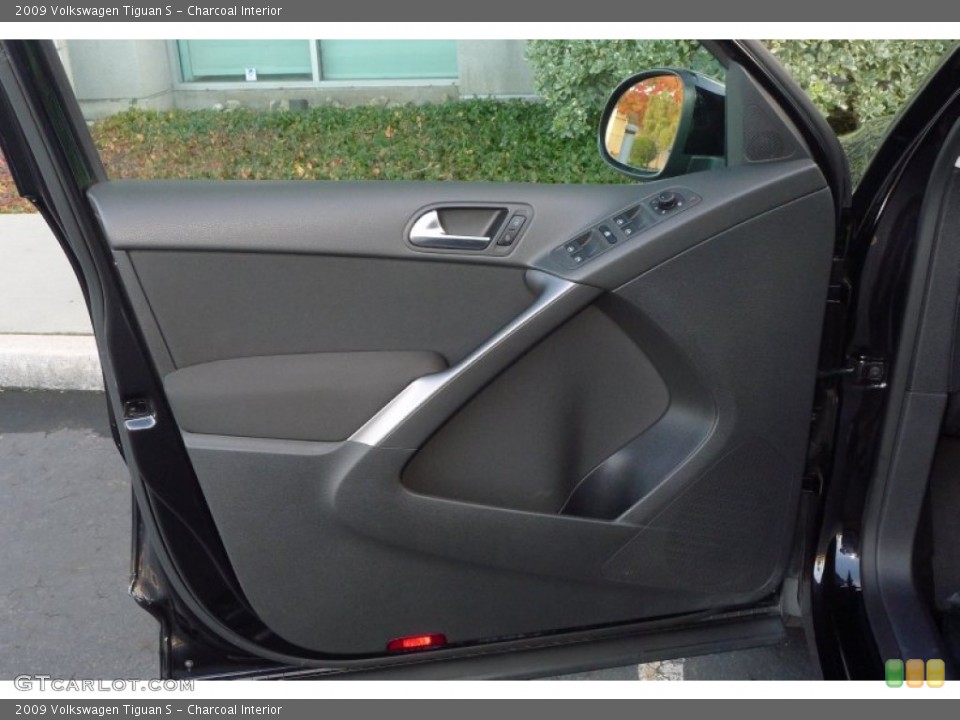 Charcoal Interior Door Panel for the 2009 Volkswagen Tiguan S #73398059
