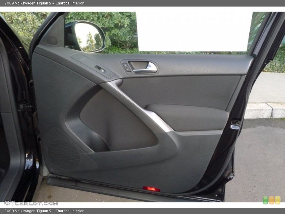 Charcoal Interior Door Panel for the 2009 Volkswagen Tiguan S #73398101