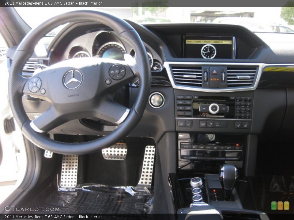 Black Interior Dashboard for the 2011 Mercedes-Benz E 63 AMG Sedan #73418871