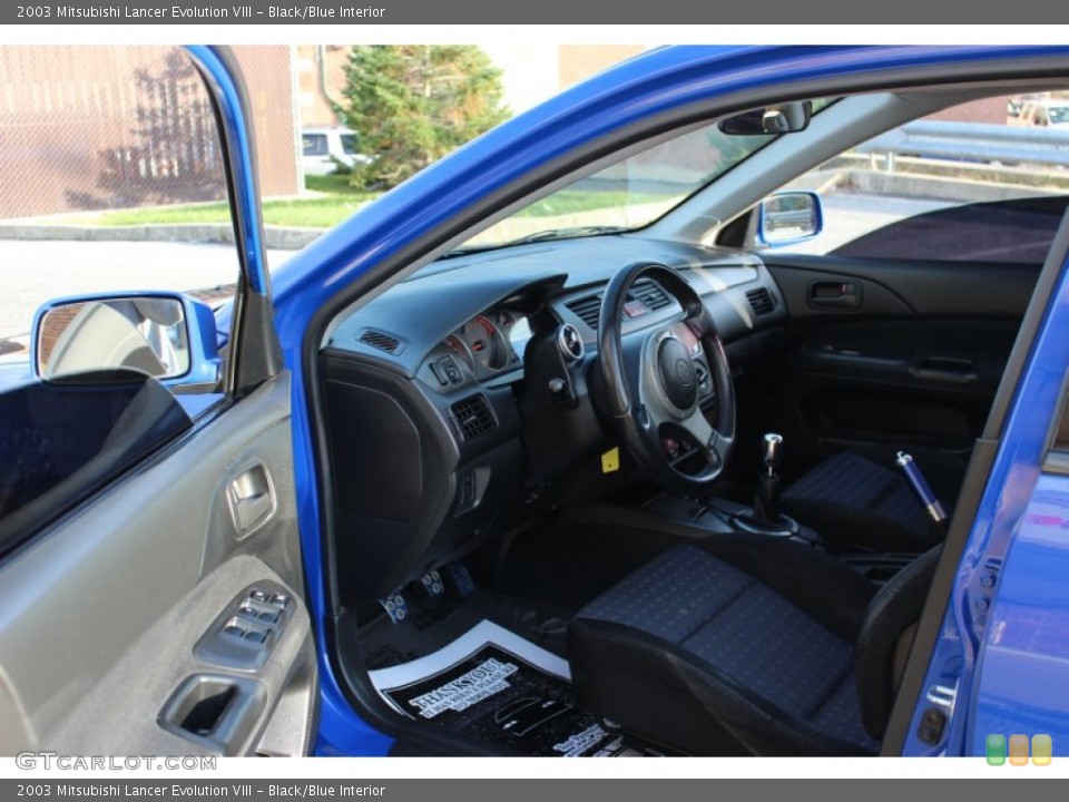 Black/Blue Interior Photo for the 2003 Mitsubishi Lancer Evolution VIII #73453178