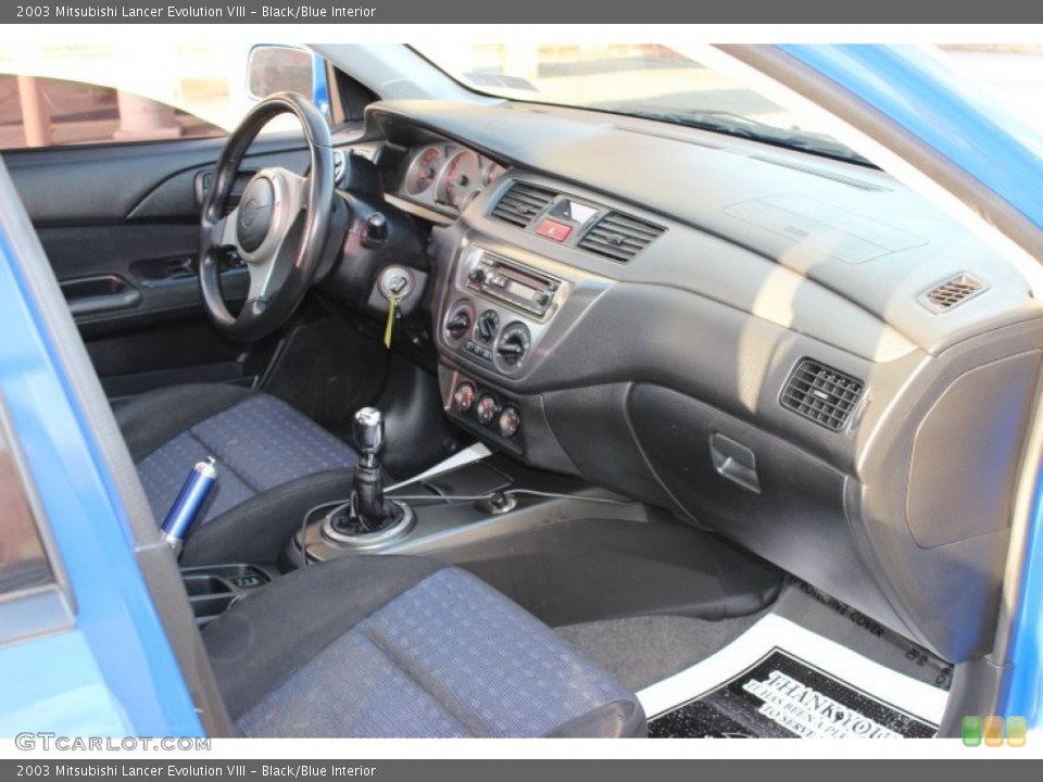 Black/Blue Interior Photo for the 2003 Mitsubishi Lancer Evolution VIII #73453199