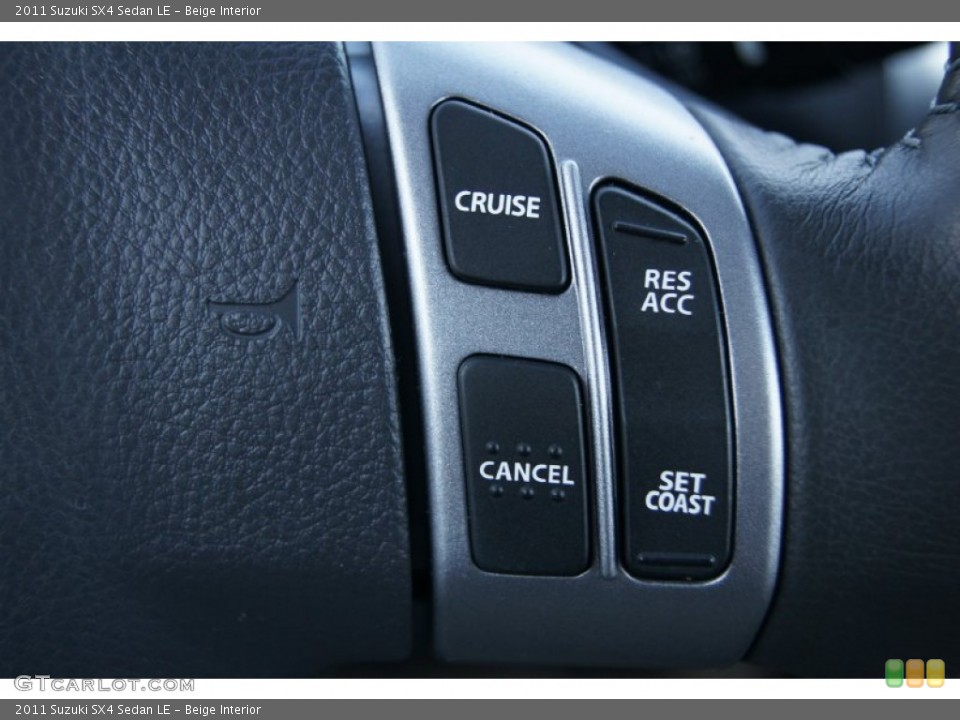 Beige Interior Controls for the 2011 Suzuki SX4 Sedan LE #73476406