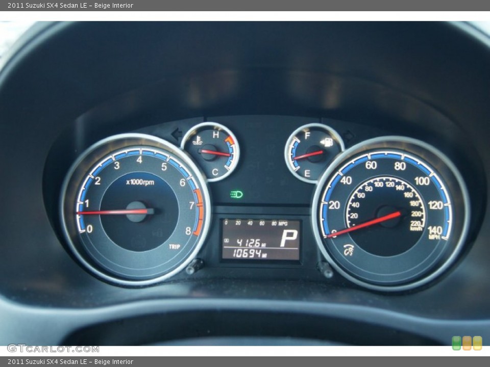 Beige Interior Gauges for the 2011 Suzuki SX4 Sedan LE #73476458
