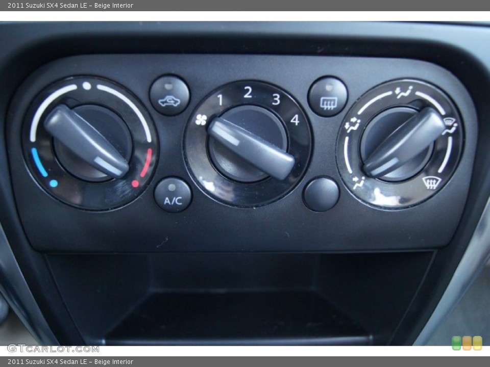 Beige Interior Controls for the 2011 Suzuki SX4 Sedan LE #73476488