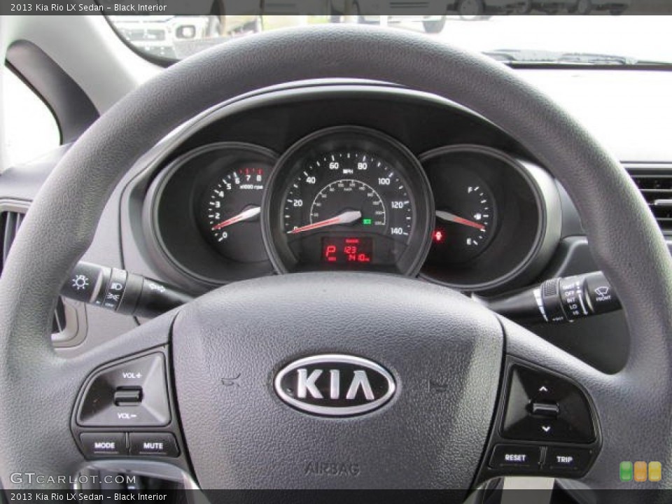 Black Interior Gauges for the 2013 Kia Rio LX Sedan #73486190