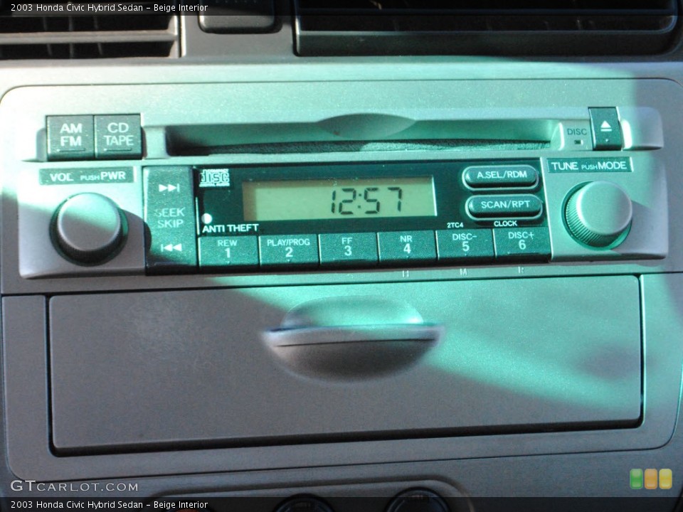 Beige Interior Audio System for the 2003 Honda Civic Hybrid Sedan #73517049
