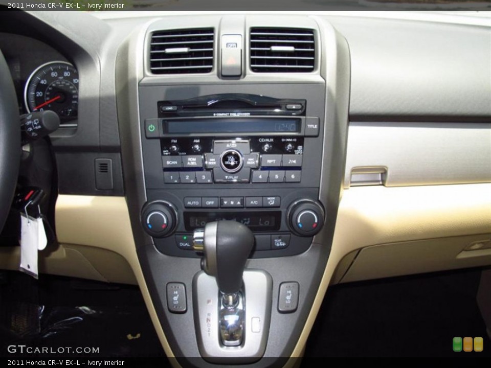 Ivory Interior Controls for the 2011 Honda CR-V EX-L #73573719