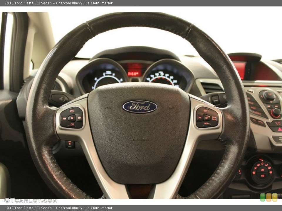 Charcoal Black/Blue Cloth Interior Steering Wheel for the 2011 Ford Fiesta SEL Sedan #73582574