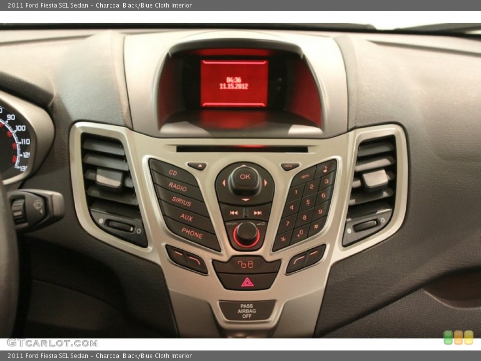 Charcoal Black/Blue Cloth Interior Controls for the 2011 Ford Fiesta SEL Sedan #73582620