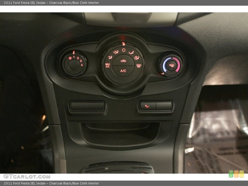 Charcoal Black/Blue Cloth Interior Controls for the 2011 Ford Fiesta SEL Sedan #73582644