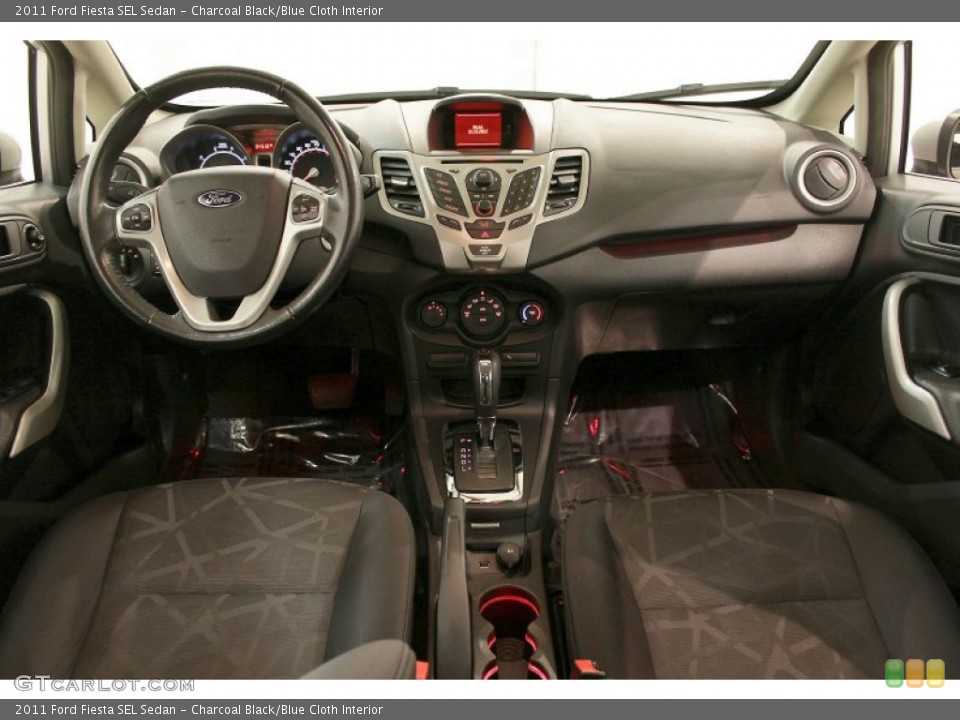 Charcoal Black/Blue Cloth Interior Dashboard for the 2011 Ford Fiesta SEL Sedan #73582940