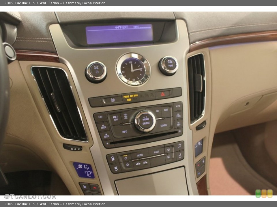 Cashmere/Cocoa Interior Controls for the 2009 Cadillac CTS 4 AWD Sedan #73630949