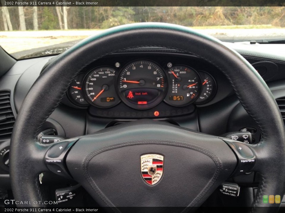 Black Interior Steering Wheel for the 2002 Porsche 911 Carrera 4 Cabriolet #73644003