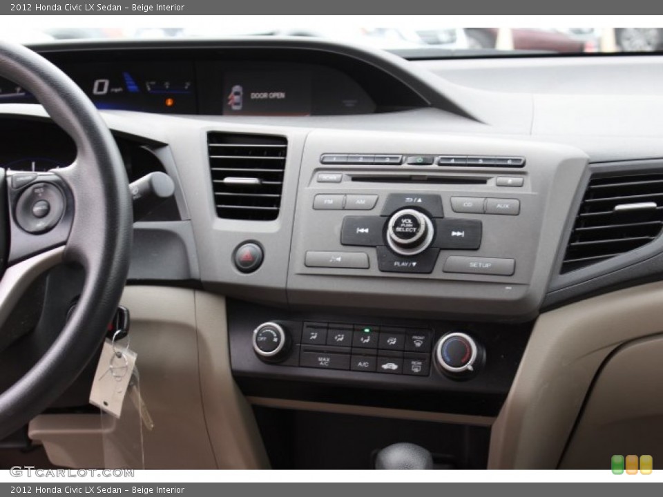 Beige Interior Controls for the 2012 Honda Civic LX Sedan #73655046
