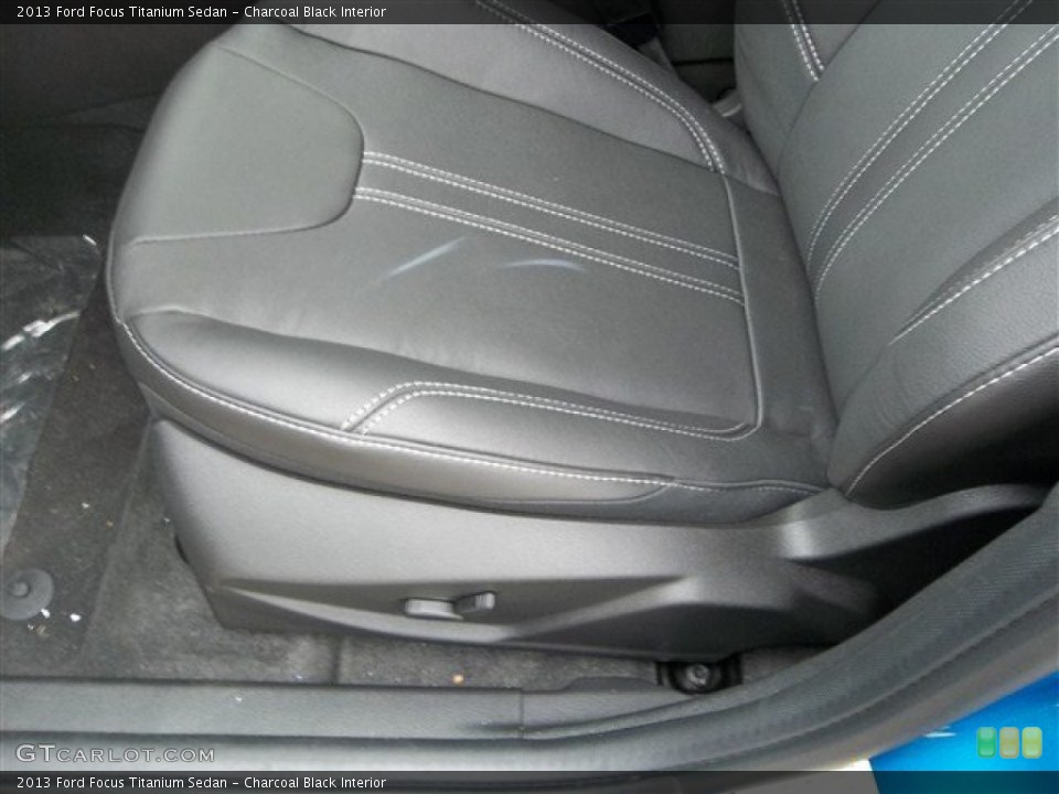 Charcoal Black Interior Front Seat for the 2013 Ford Focus Titanium Sedan #73690953