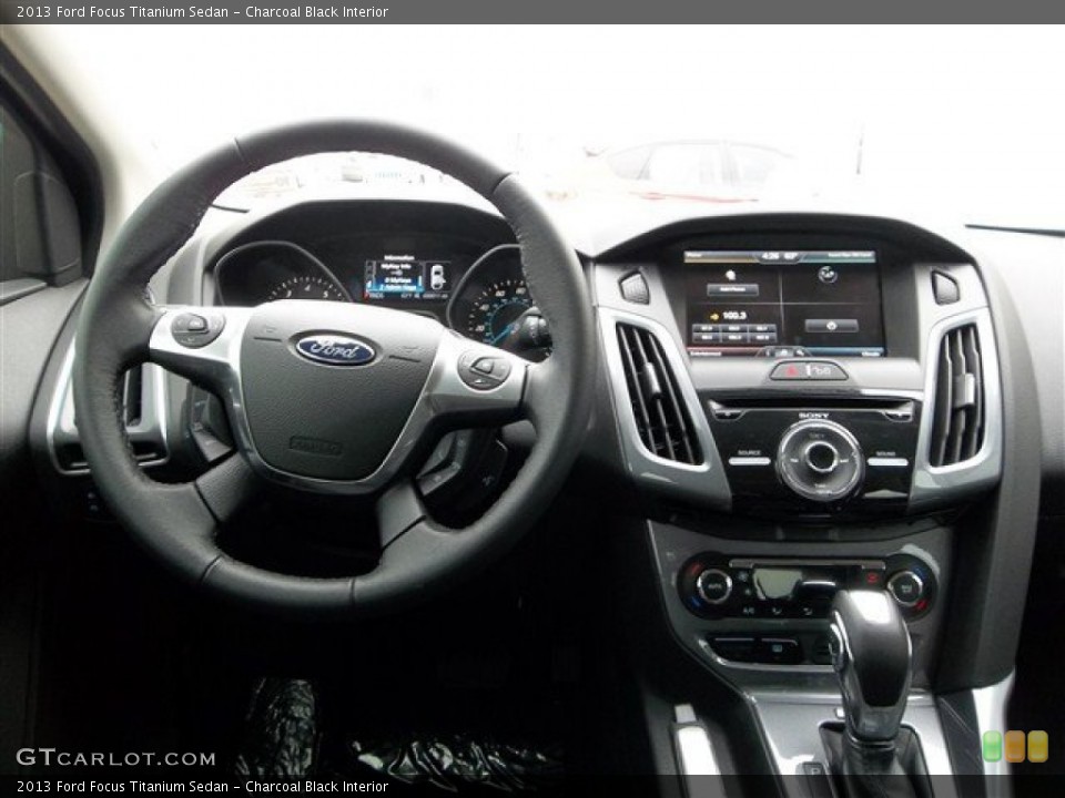 Charcoal Black Interior Dashboard for the 2013 Ford Focus Titanium Sedan #73691112