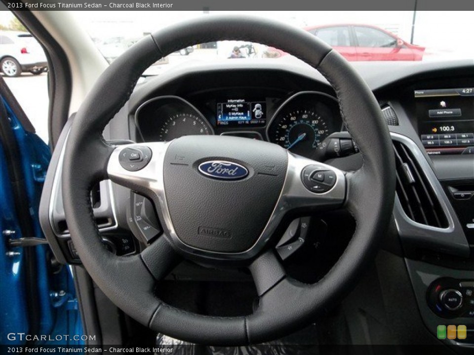 Charcoal Black Interior Steering Wheel for the 2013 Ford Focus Titanium Sedan #73691265