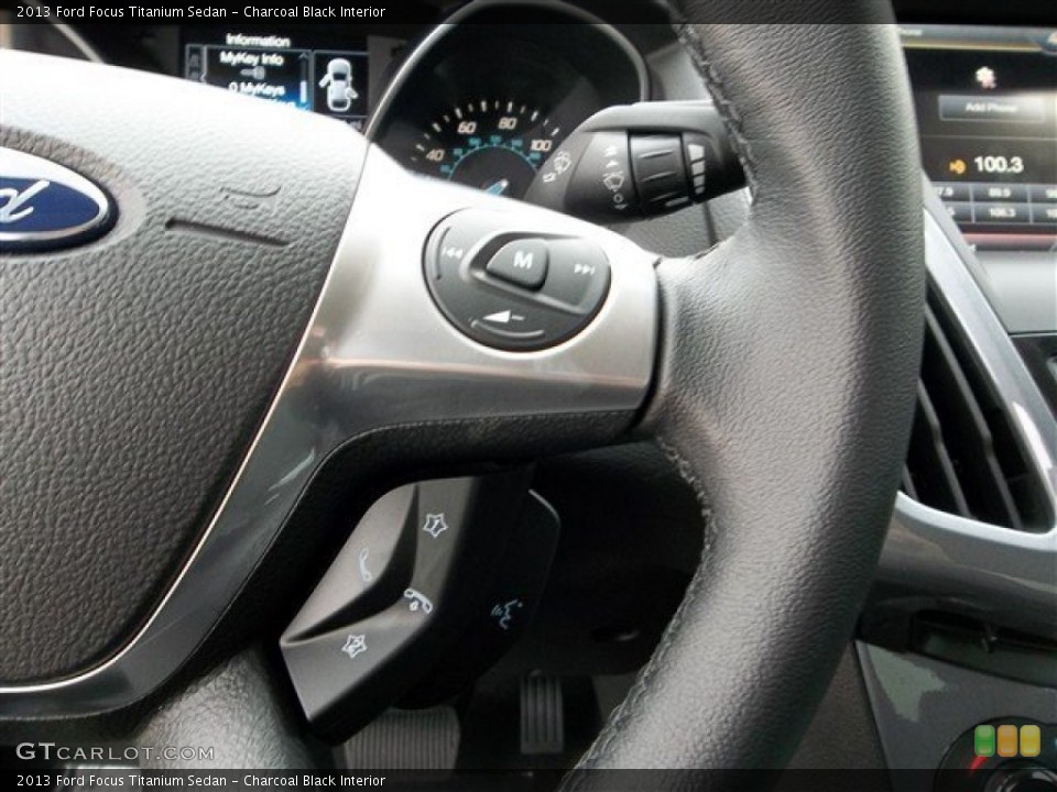 Charcoal Black Interior Controls for the 2013 Ford Focus Titanium Sedan #73691281