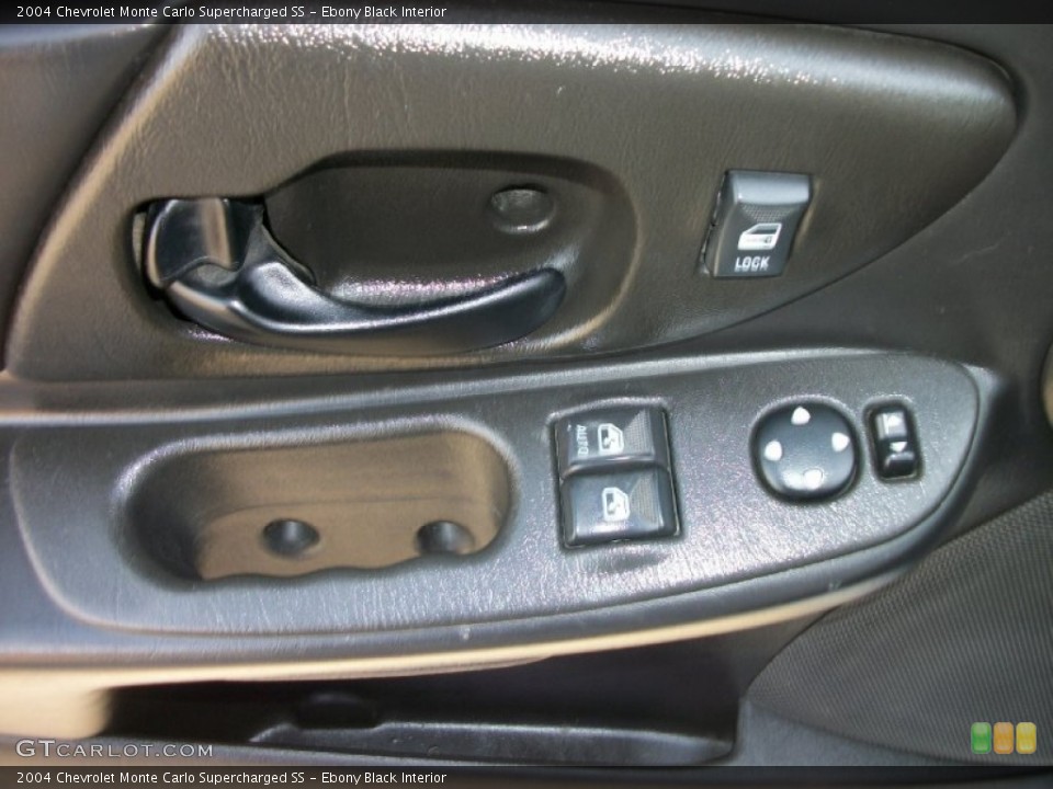 Ebony Black Interior Controls for the 2004 Chevrolet Monte Carlo Supercharged SS #73714295