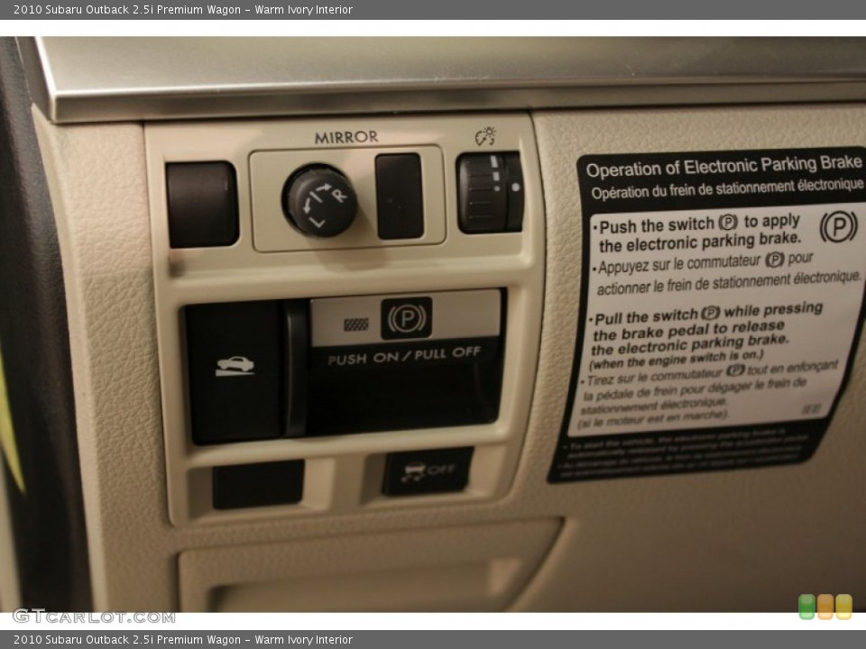 Warm Ivory Interior Controls for the 2010 Subaru Outback 2.5i Premium Wagon #73719044