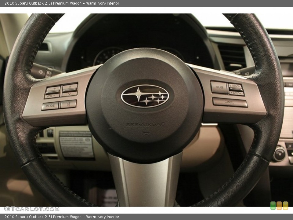 Warm Ivory Interior Steering Wheel for the 2010 Subaru Outback 2.5i Premium Wagon #73719098