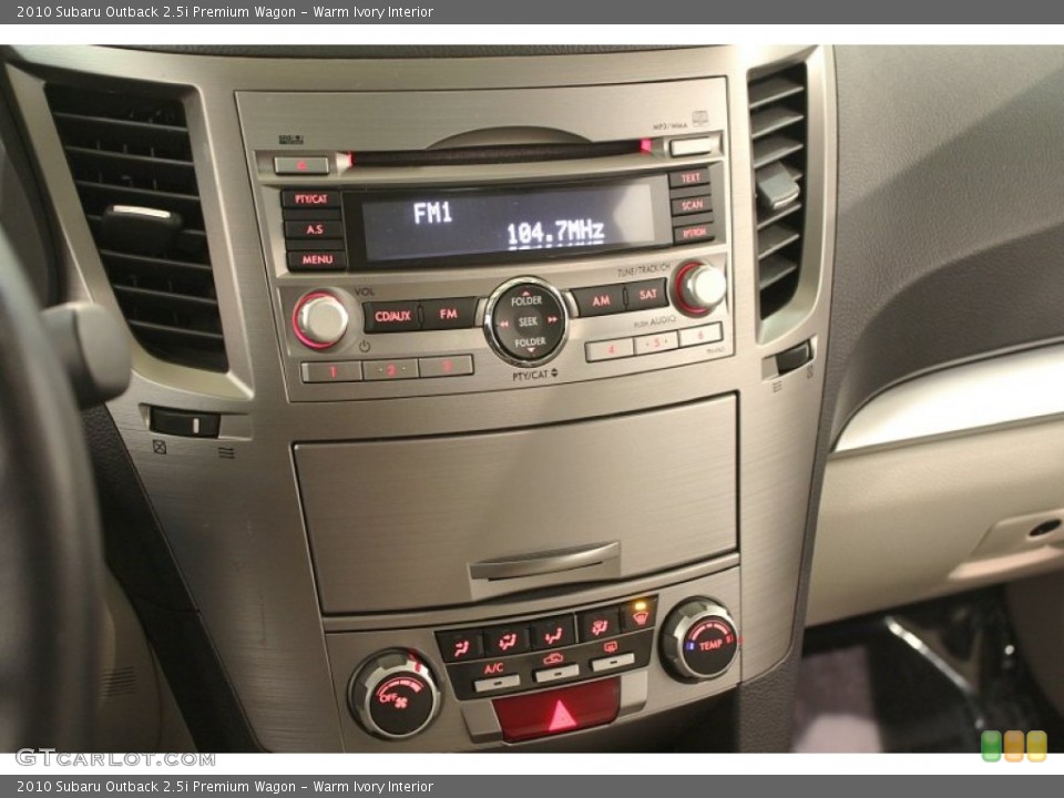 Warm Ivory Interior Controls for the 2010 Subaru Outback 2.5i Premium Wagon #73719140