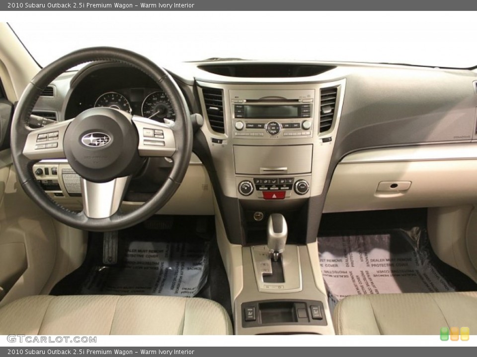 Warm Ivory Interior Dashboard for the 2010 Subaru Outback 2.5i Premium Wagon #73719260