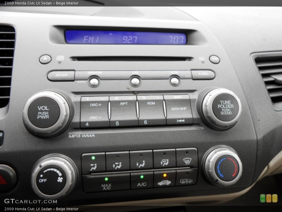 Beige Interior Controls for the 2009 Honda Civic LX Sedan #73719872