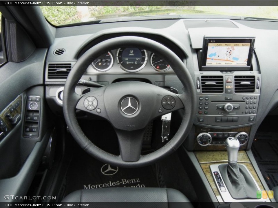 Black Interior Dashboard for the 2010 Mercedes-Benz C 350 Sport #73735403
