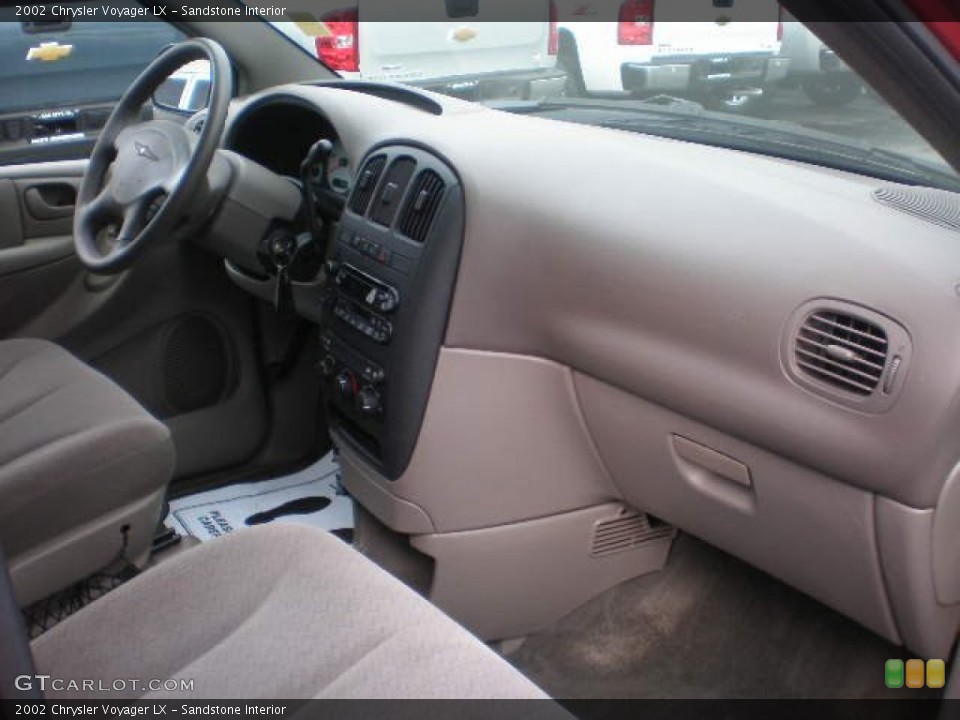 Sandstone Interior Dashboard for the 2002 Chrysler Voyager LX #73754978