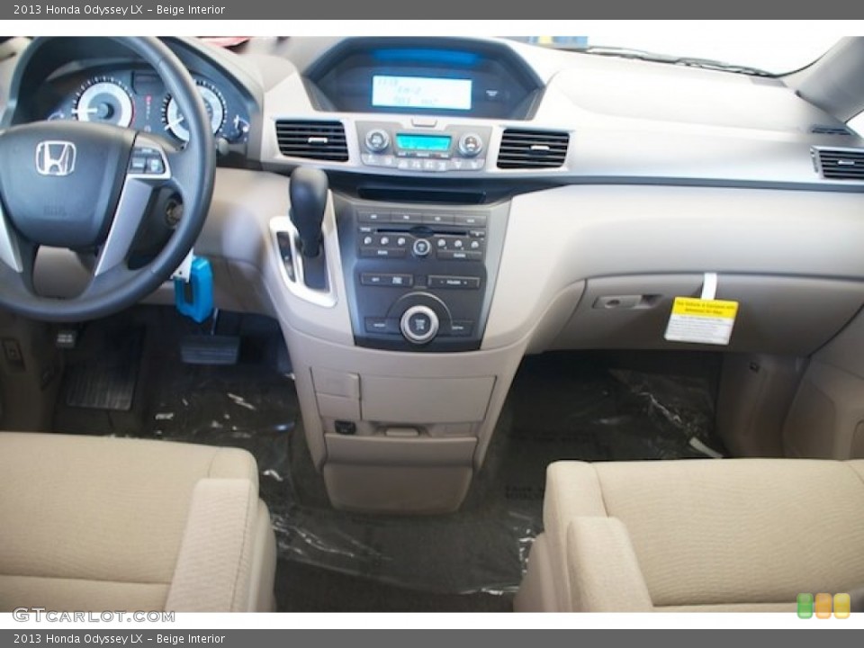 Beige Interior Dashboard for the 2013 Honda Odyssey LX #73755326