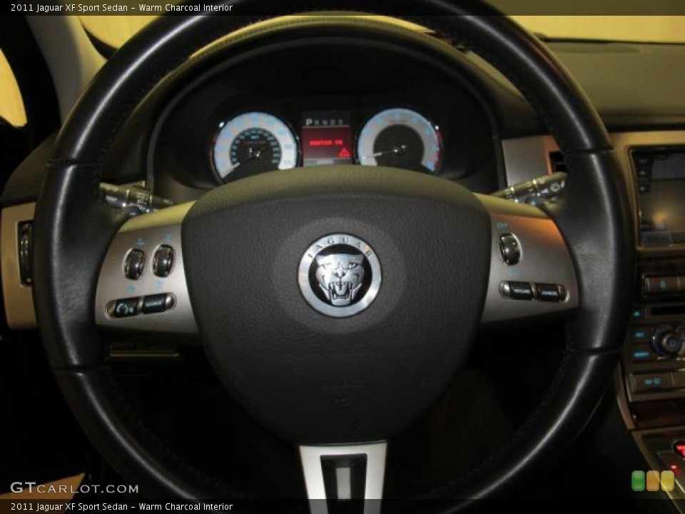Warm Charcoal Interior Steering Wheel for the 2011 Jaguar XF Sport Sedan #73764599