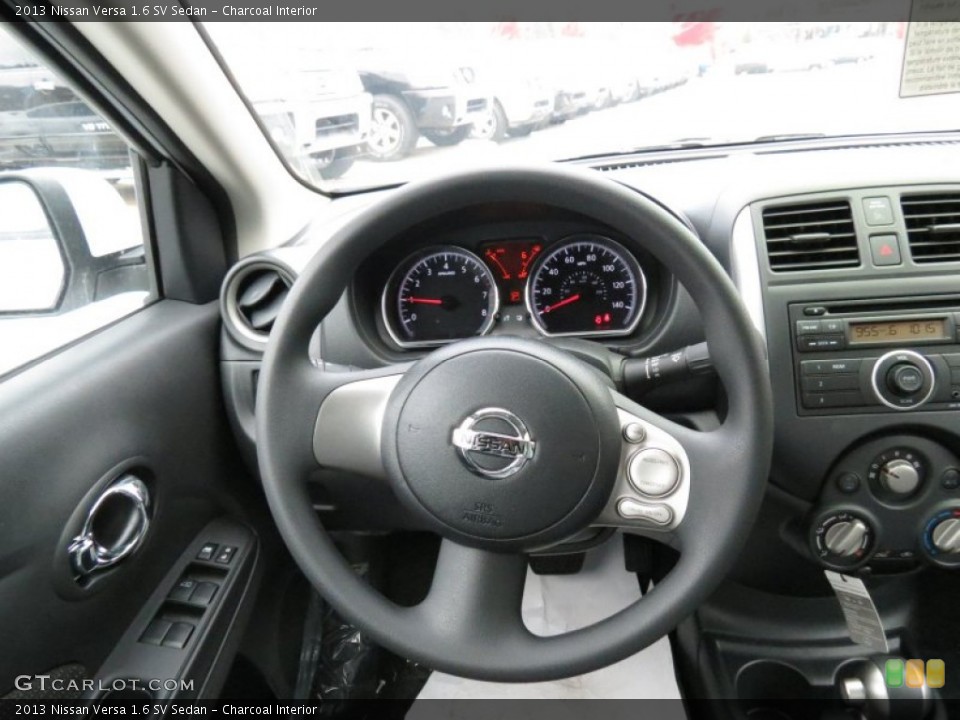 Charcoal Interior Steering Wheel for the 2013 Nissan Versa 1.6 SV Sedan #73770179