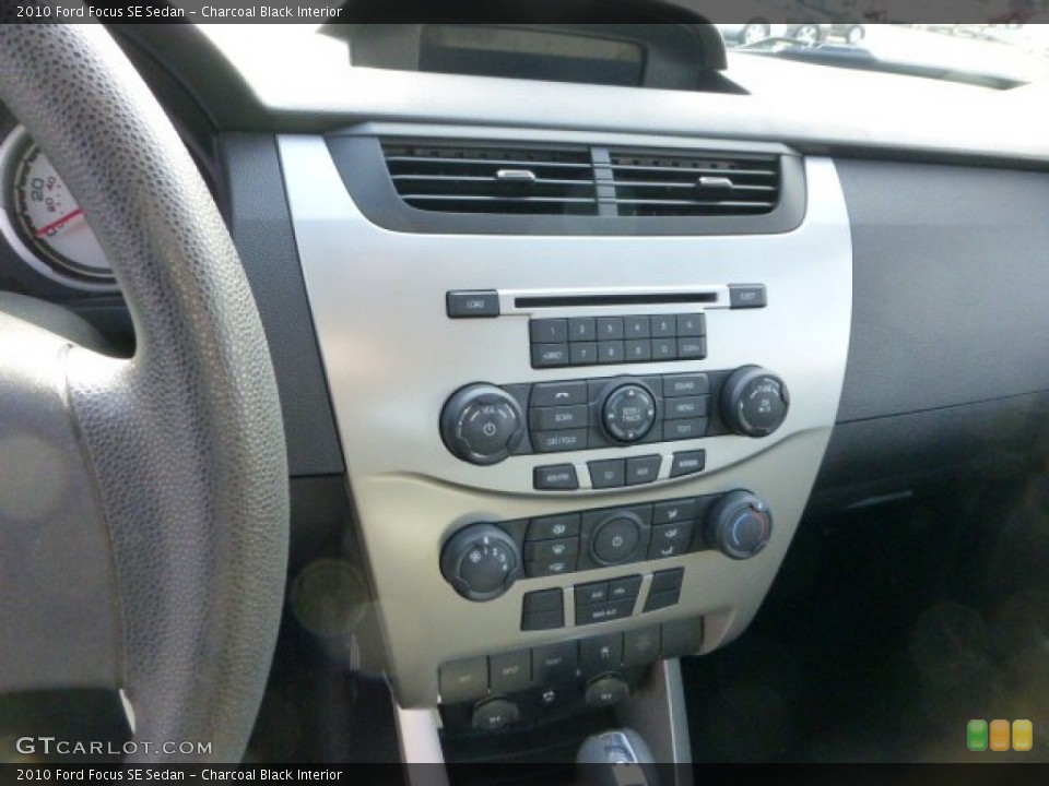 Charcoal Black Interior Controls for the 2010 Ford Focus SE Sedan #73778402