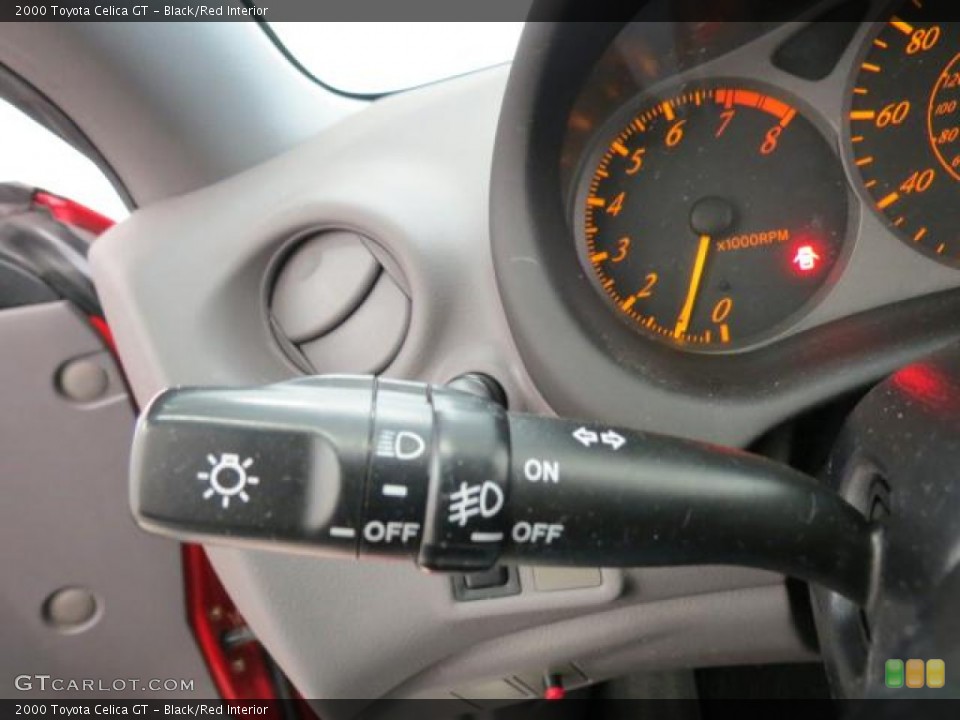 Black/Red Interior Controls for the 2000 Toyota Celica GT #73785515