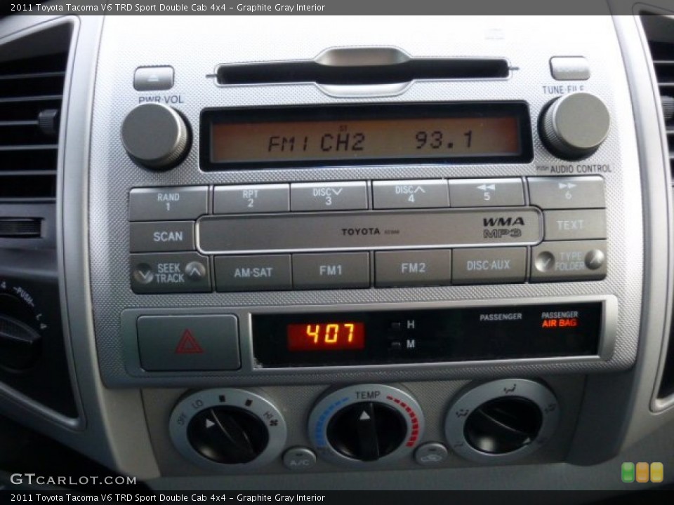 Graphite Gray Interior Controls for the 2011 Toyota Tacoma V6 TRD Sport Double Cab 4x4 #73786346