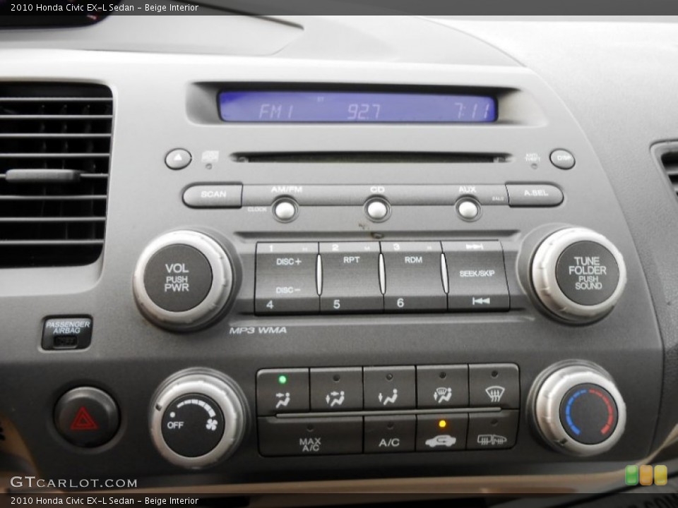 Beige Interior Controls for the 2010 Honda Civic EX-L Sedan #73788263