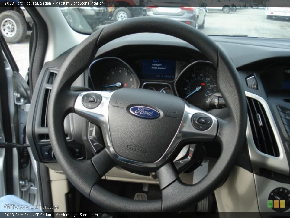 Medium Light Stone Interior Steering Wheel for the 2013 Ford Focus SE Sedan #73789861