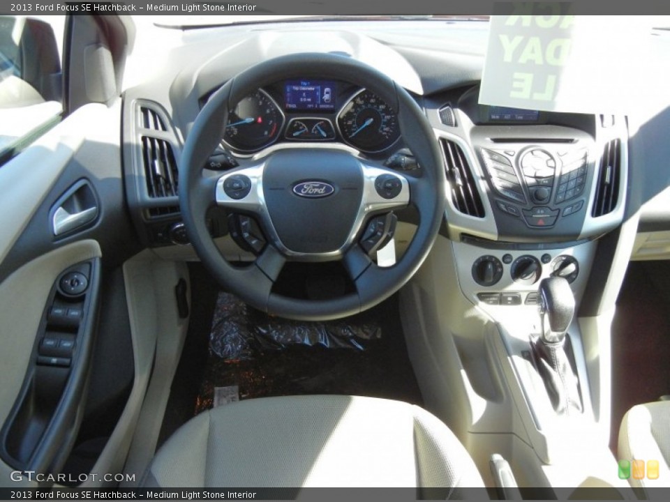 Medium Light Stone Interior Dashboard for the 2013 Ford Focus SE Hatchback #73811290