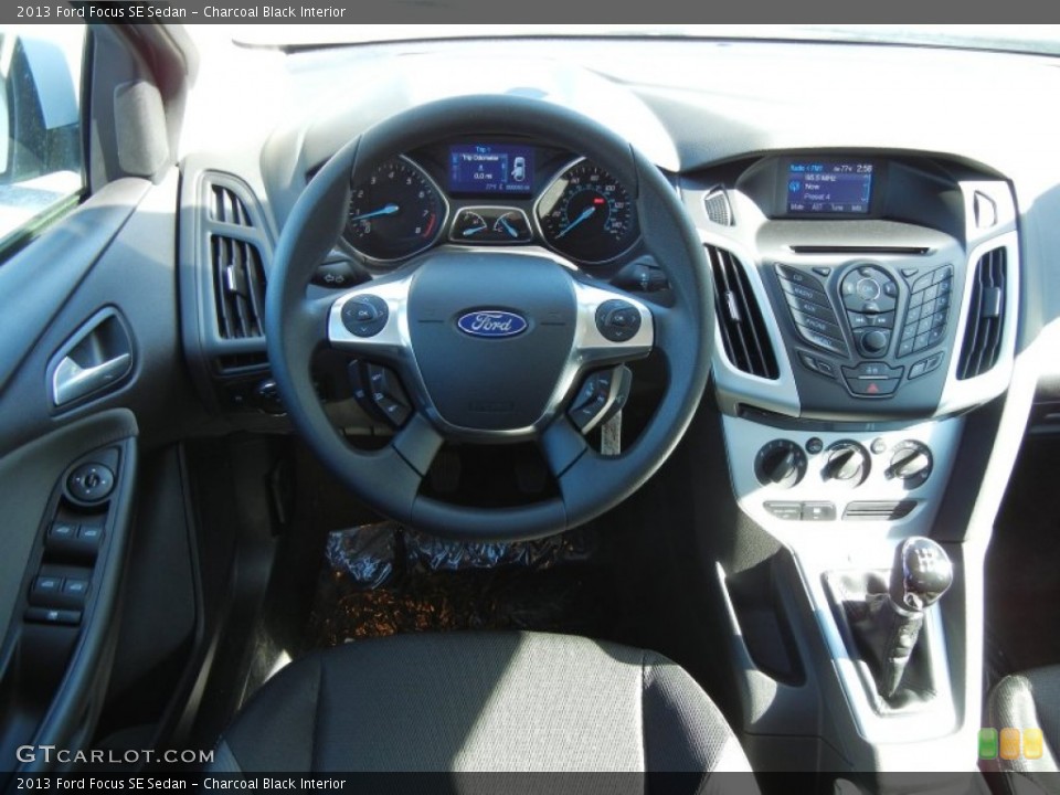 Charcoal Black Interior Dashboard for the 2013 Ford Focus SE Sedan #73812515