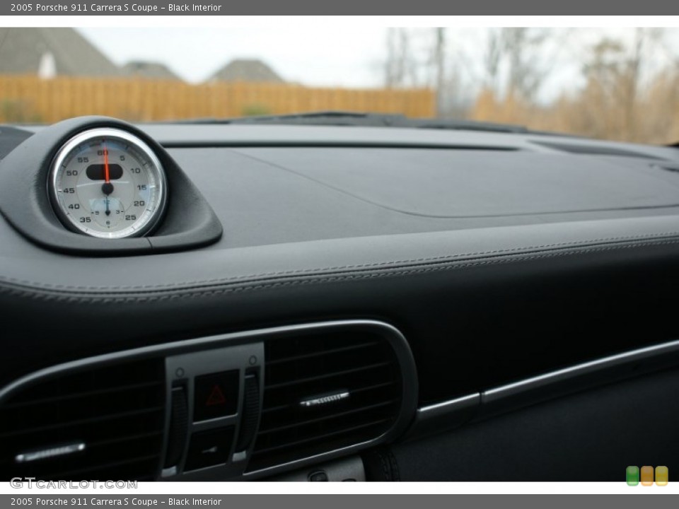 Black Interior Dashboard for the 2005 Porsche 911 Carrera S Coupe #73818944