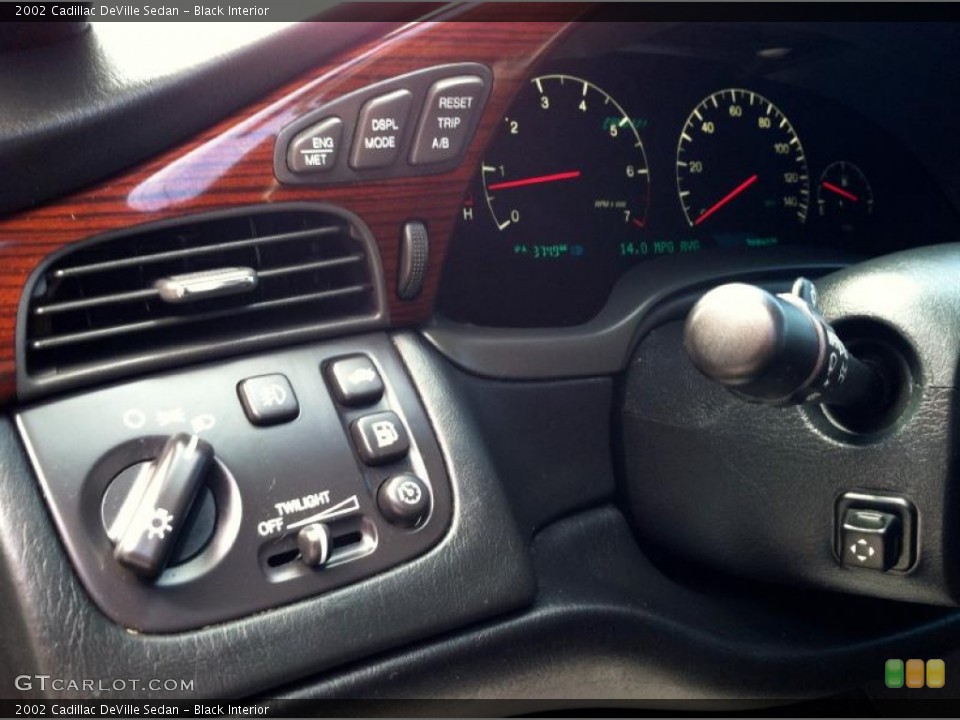Black Interior Controls for the 2002 Cadillac DeVille Sedan #73851833