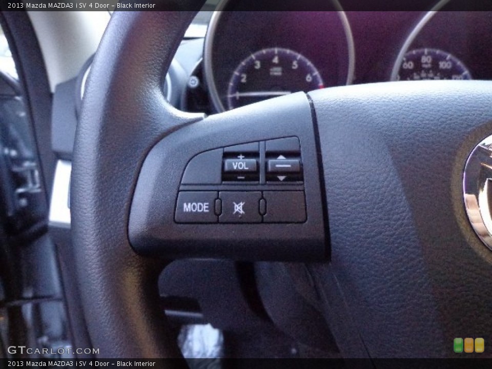 Black Interior Controls for the 2013 Mazda MAZDA3 i SV 4 Door #73873486