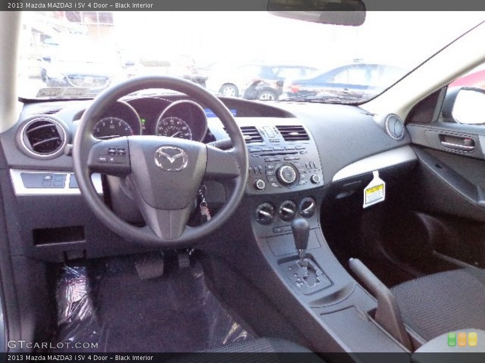 Black Interior Dashboard for the 2013 Mazda MAZDA3 i SV 4 Door #73873721