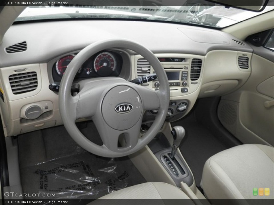 Beige Interior Prime Interior for the 2010 Kia Rio LX Sedan #73880971
