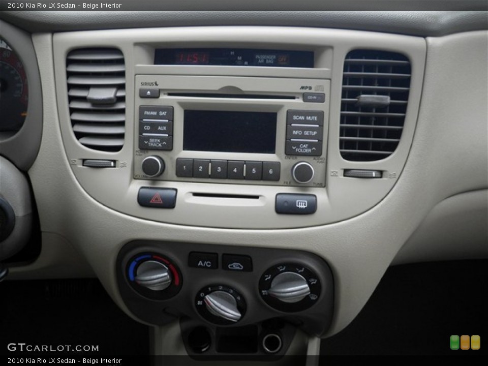 Beige Interior Controls for the 2010 Kia Rio LX Sedan #73881047