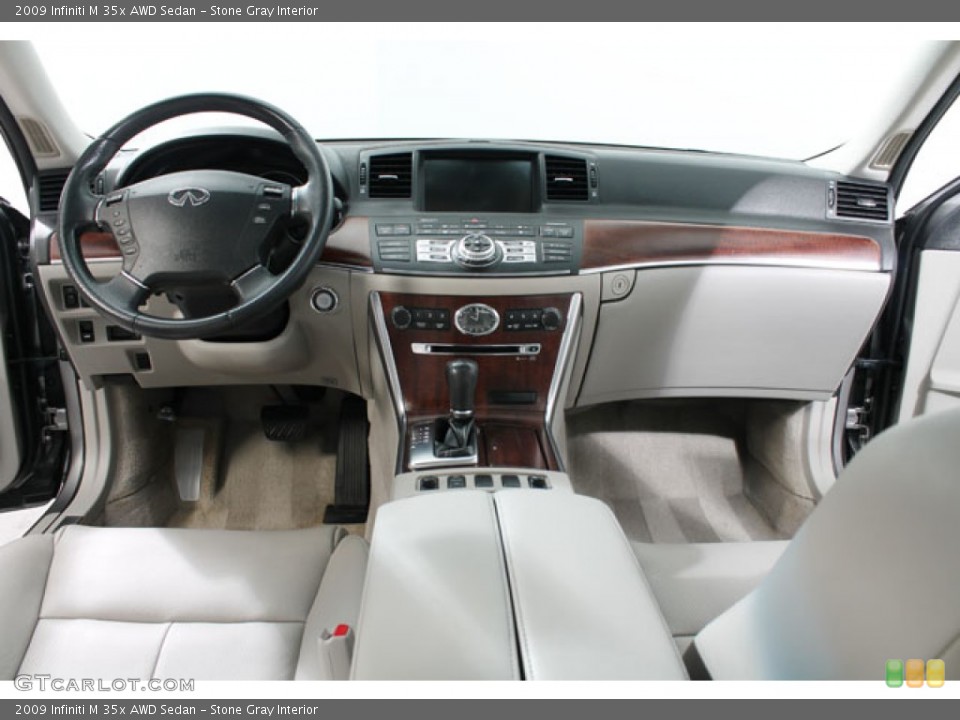 Stone Gray Interior Dashboard for the 2009 Infiniti M 35x AWD Sedan #73883495