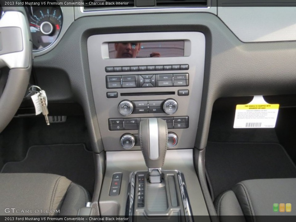Charcoal Black Interior Controls for the 2013 Ford Mustang V6 Premium Convertible #73893665